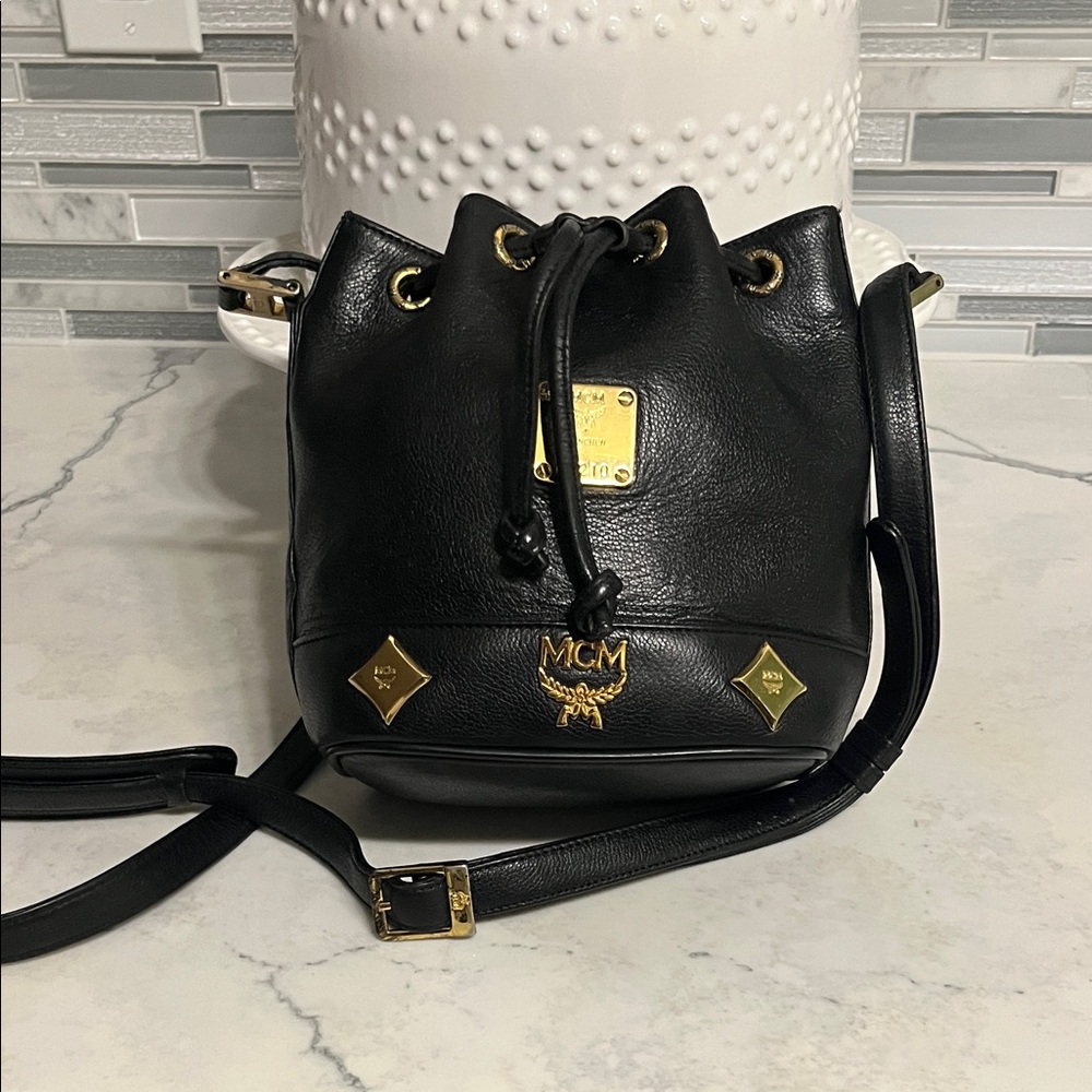 MCM Black Leather Drawstring Crossbody with Gold Hardware